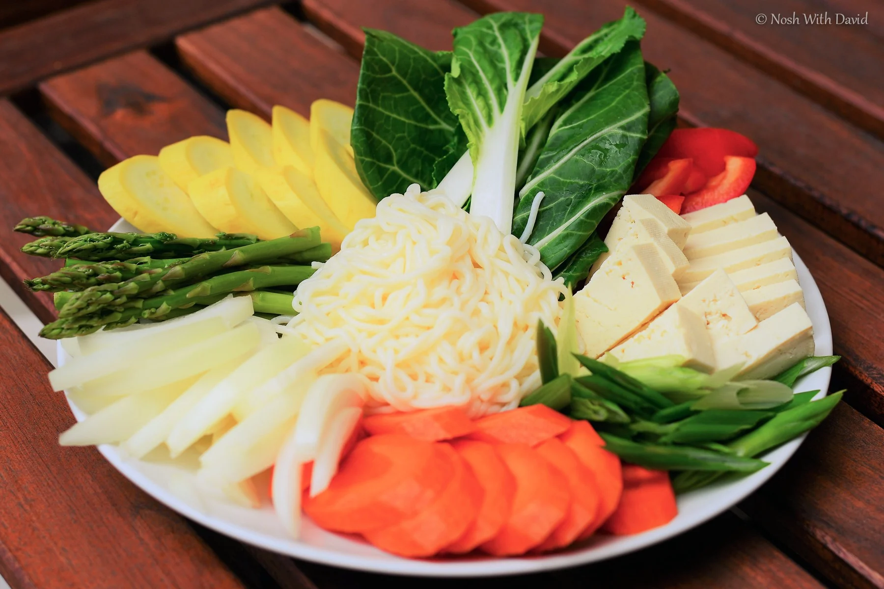 Sukiyaki: A Harmony of Beef, Vegetables, Tofu, and a Sweet broth.